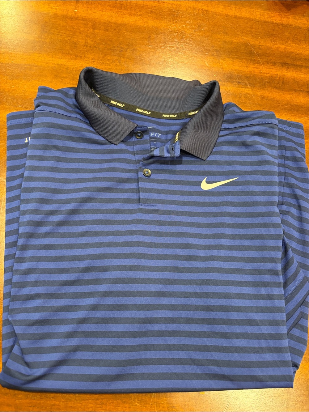 Nike Men's Navy and Black Striped Dri-FIT Polo with Yellow Swoosh